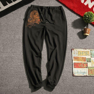 Carbon black Tang Dynasty inspired sweatpants dragon design