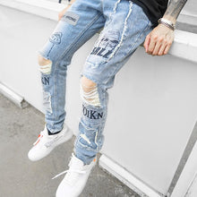 Load image into Gallery viewer, Graffiti reflector jeans