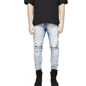 Distressed skinny ripped jeans