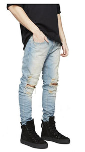 Distressed skinny ripped jeans