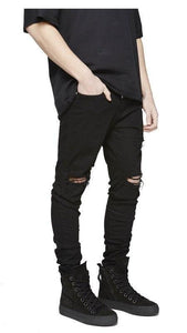 Distressed skinny ripped jeans